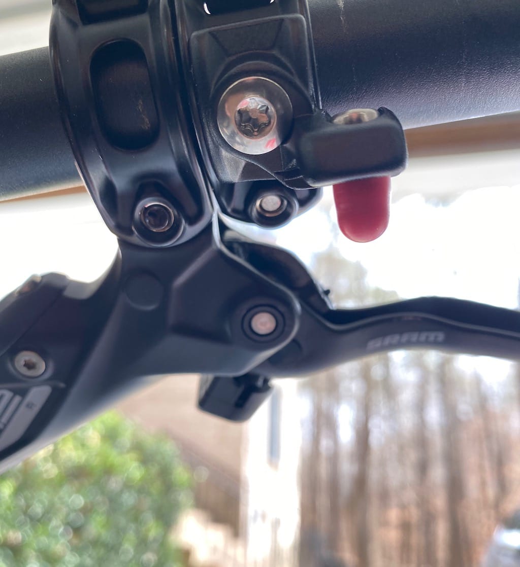 SRAM standard G2 bar clamp vs MMX on right