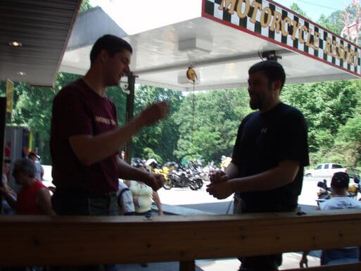 rooster roaming hotel grounds